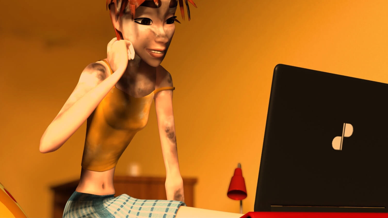 Una mujer con harina en la cara se sienta frente a un ordenador portátil con el logotipo de DigiPen