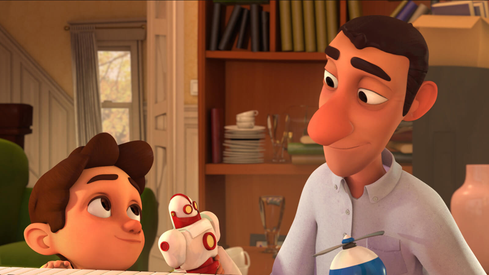 A man and boy in a house look at each other while holding red-white and blue-white plastic toys
