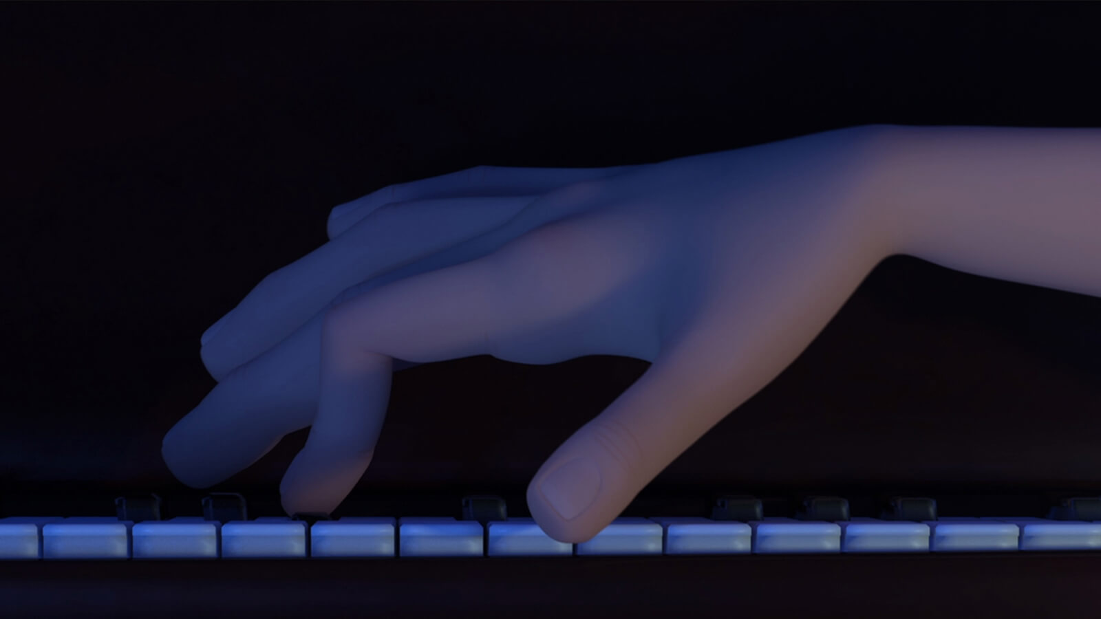 Extreme close up of a hand hovering over a piano keyboard in a dimly lit room