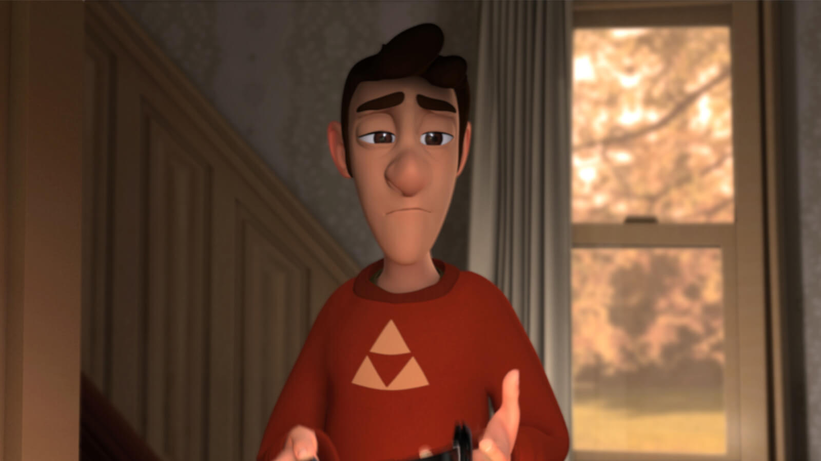 Man in a red sweater with a yellow triforce logo looks pensive next to a staircase and window