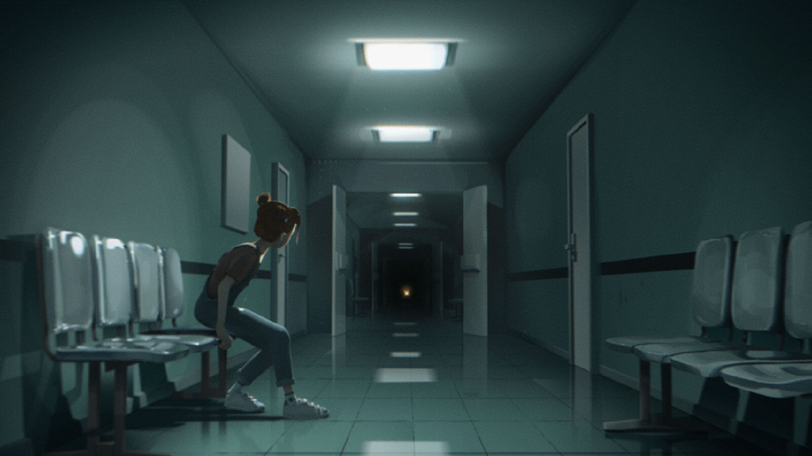 Girl sits at the side of a medical hallway, gaze fixed on the distant end.