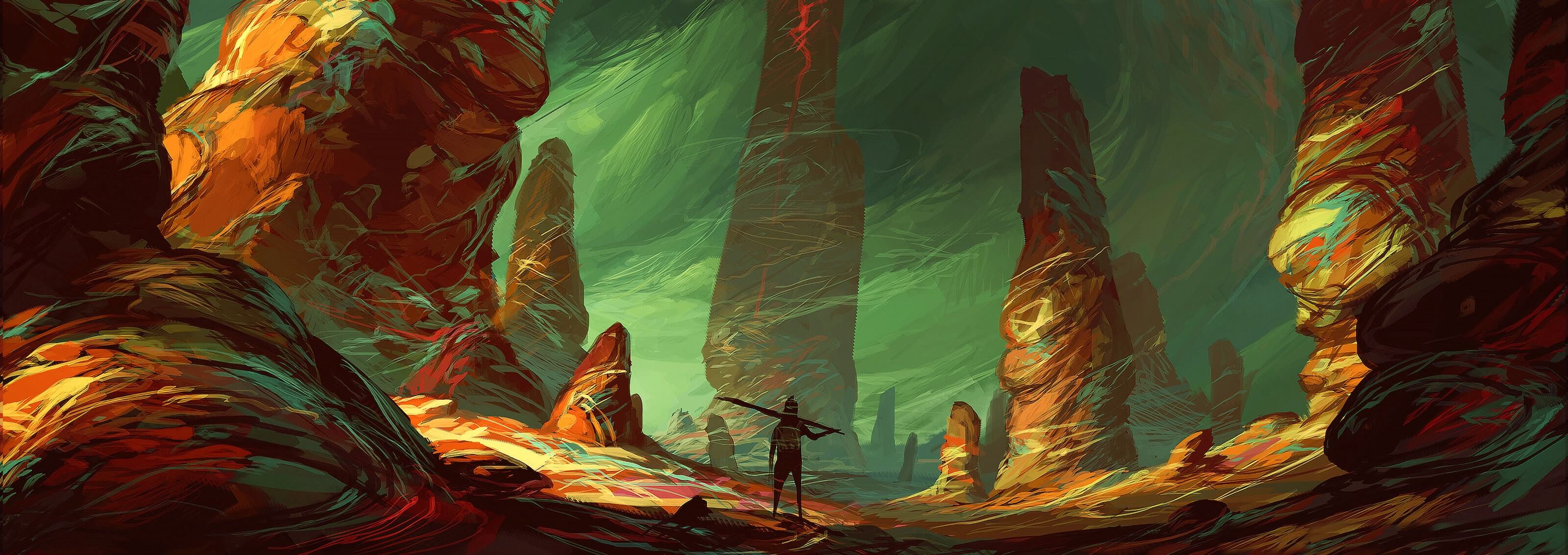 A rocky, alien environment with colorful outcroppings dwarf a humanoid figure standing with its back turned in the foreground