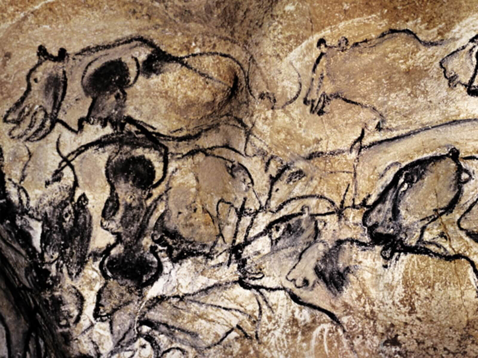 Una pintura rupestre que representa a un grupo de animales