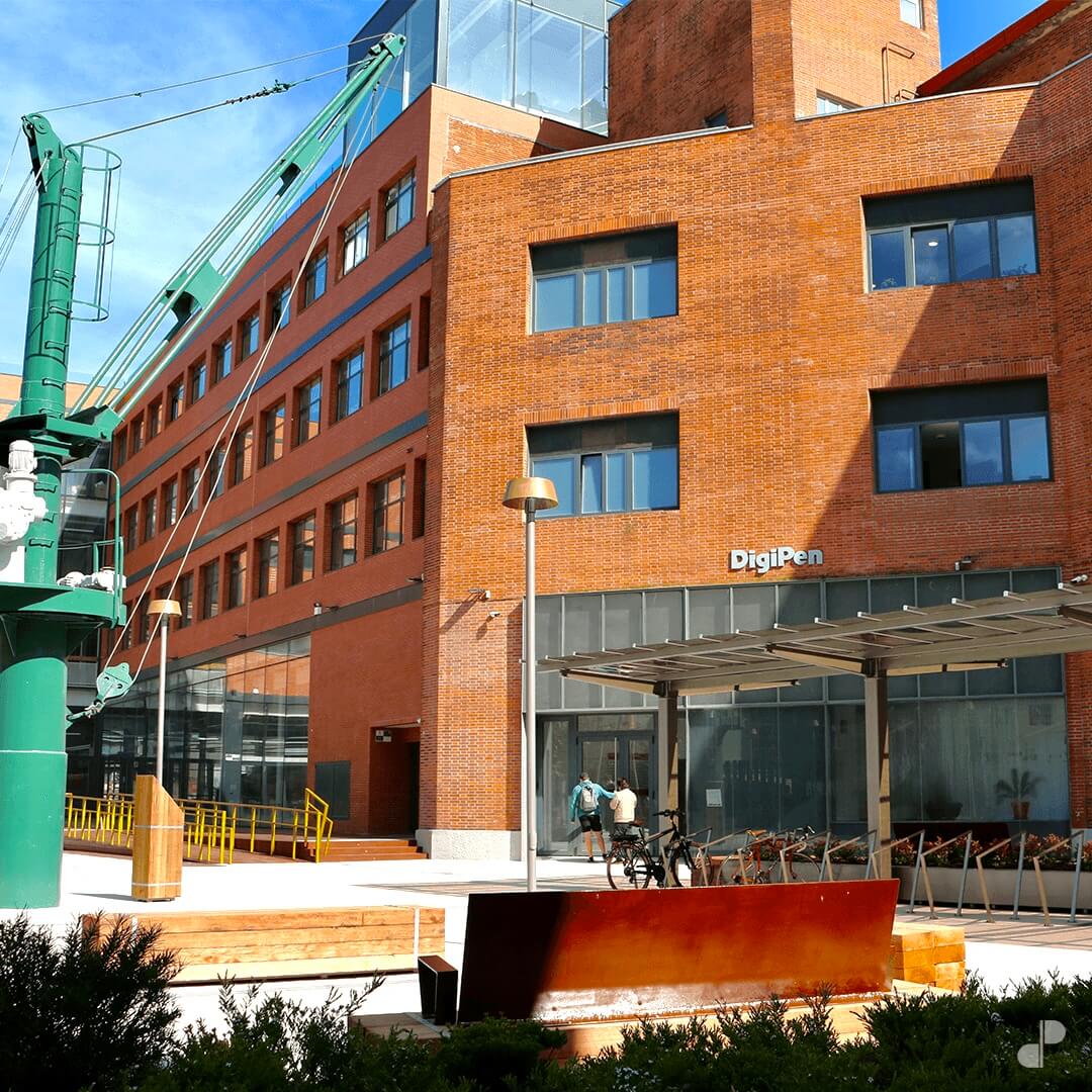 Photograph of the front entrance of the DigiPen Bilbao campus building.